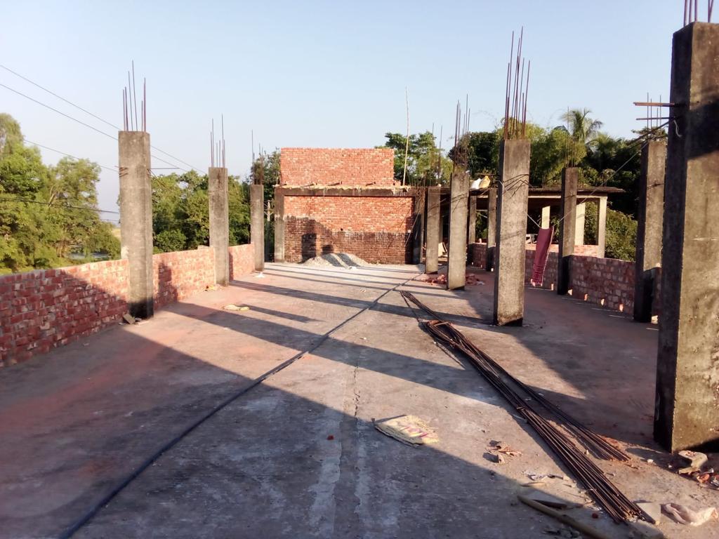 Brickwork and pillars under construction on the rooftop