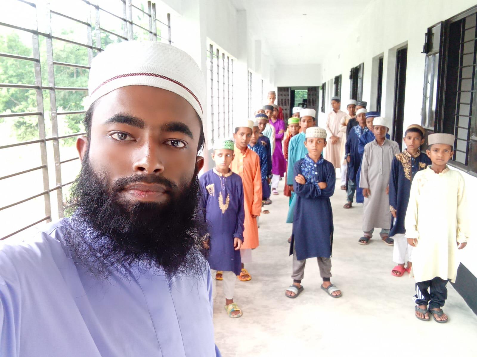 A visitor with children in a corridor