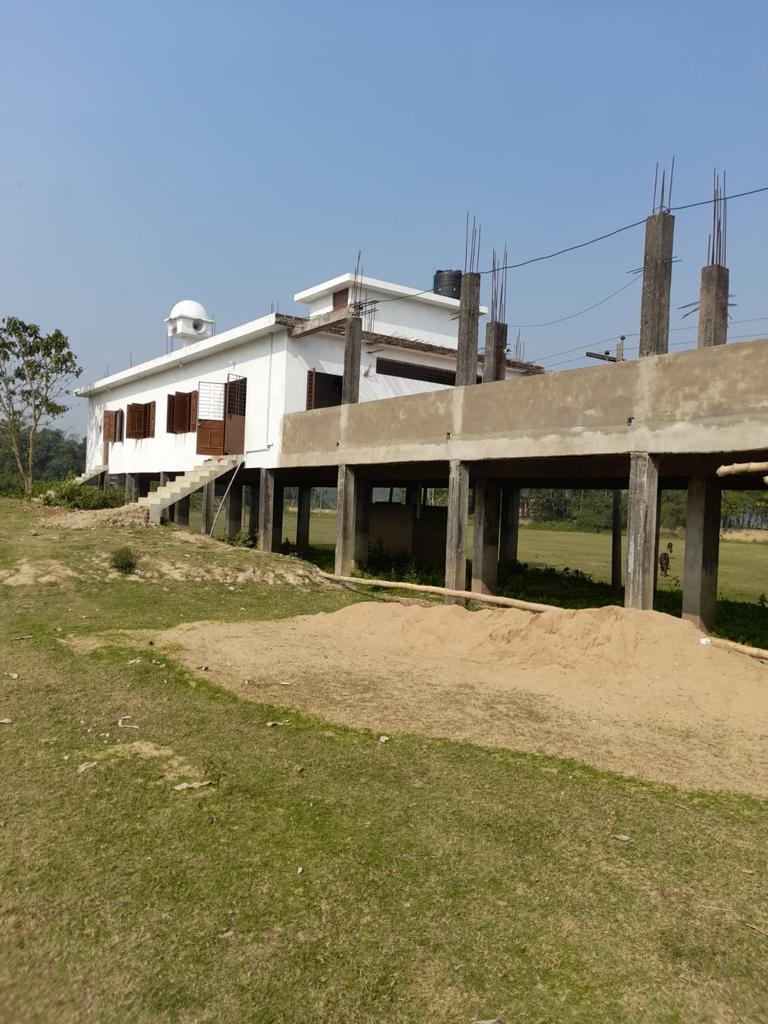 An extension under construction beside the academy building